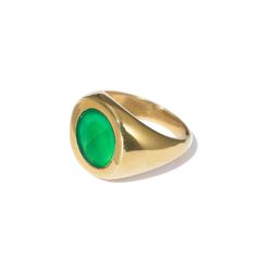 An update of an iconic style, our gold-plated Petra Circle Signet Ring surprises and delights with a beautiful green agate semi-precious stone. Worn alone or with a stack of rings, Petra always stands out. Crafted from a layer of gold over Italian brass, the Petra Circle Signet Ring is shaped and polished by hand. Details Everything you need to know. Measures 0.6" on it's face. Sizes 5-9. Handcrafted from semi-precious stones and gold plated Italian Brass in Bali. Each ring is one-of-a-kind. To Classic Green Open Signet Ring, Green Gemstone Ring Gold-plated, Green Gemstone Gold Plated Rings, Classic Green Jewelry With Large Stone, Elegant Gold Emerald Ring With Natural Stones, Classic Chrysoprase Ring Jewelry, Gold Chrysoprase Ring, Gold Agate Rings With Polished Finish, Classic Gold Rings With Jade