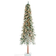 a christmas tree with lights and snow on the top is standing in front of a white background