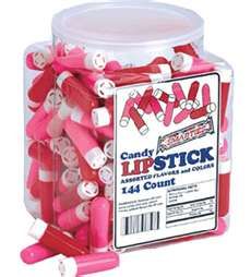 pink and white candy sticks in a plastic container