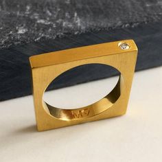 Sign up now and get 10% off your first purchasehttps://signup.majdanrocks.comThis is a lovely, minimal ring, which looks great worn on its own or 2 stacked together. It can also be used as a simple yet sophisticated wedding band. Available in Matt finish.All my jewellery is handmade in London, UK. Made from sterling silver and available in 18ct gold plate, 18ct rose gold plate and silver (unplated). Set with one 1.5 mm SI quality diamond. Thickness of band: 3 mmWeight: 6 gIf you would like to or Modern Round Band Diamond Ring As Gift, Modern Diamond Ring With Round Band As Gift, Modern Single Diamond Wedding Ring, Minimalist Princess Cut Diamond Wedding Ring, Modern Wedding Rings With Vs Clarity, Modern Princess Cut Diamond Ring For Wedding, Modern Princess Cut Diamond Wedding Ring, Modern Wedding Diamond Ring With Single Cut Diamonds, Modern Single Cut Diamond Wedding Ring