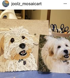 two pictures of dogs are on display in front of scissors and other crafting supplies