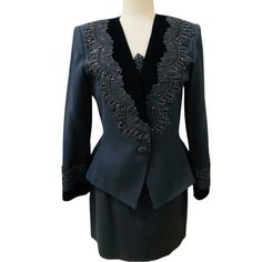 Gorgeous Vintage New Nolan Miller “Dynasty” 3pc Jacket , Camisole, Skirt~ Lined Suit. Black Wool Crepe , Velvet, Sequin Beaded French Alencon Lace. Size 10. Jacket~ Shoulder 16.5”, Sleeve 24”, Underarm 38”, Waist 31.5”, Length 23”( Has Shoulderpads/One Beaded Button Snap Closure) ***Skirt~ Waist 29”, Hip 39.5”, Length 16-3/4”. ***Camisole~Bust 36”. Beautiful Designer Cocktail Evening Dressy Suit. New Condition/Never Worn Elegant Embellished Evening Sets, Tailored Embellished Evening Sets, Tailored Embellished Sets For Evening, Elegant Embellished Formal Sets, Elegant Embellished Suits For Evening, Elegant Embellished Evening Suits, Elegant Embellished Sets For Formal Occasion, Embellished Fitted Sets For Workwear, Embellished Sets For Workwear