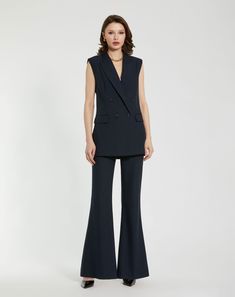 Our Classic Crepe Flared Trouser is a versatile wardrobe essential, combining timeless elegance with a retro flair. Pair them with a blouse for a polished professional ensemble, or dress them down with a casual top for a relaxed yet refined look. With their timeless appeal and comfortable fit, these trousers are sure to become a staple in your wardrobe rotation. Mac Duggal Crepe fabric (100% polyester) Fully lined High rise Front darts Inseam pockets Zip fly with concealed button closure Flare l Sleeveless Blazer Vest, Daytime Wedding, Sleeveless Blazer, Maxi Dresses Fall, Fall Wedding Guest Dress, Brocade Dresses, Bride Groom Dress, Western Chic, Full Length Dress