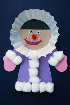 a paper doll made to look like a snowman