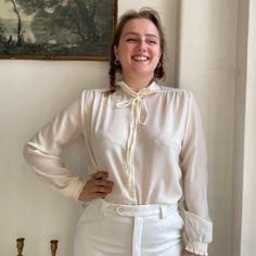 "Adorable true vintage blouse featuring a statement collar that adds a dash of cottage core charm. This beautiful 1/2 sleeve boho white blouse can be styled on its own but also works great as an under layer with that cute collar showing through. Talk about a vintage cottage core gem!🌻  Comes in recycled plastic free packaging ♻️ * Fits sizes UK6-10 depending on desired fit  * The model is 5'7\" and wears size UK10-12  * Pit to Pit - 20\" * Top to bottom - 22.5\"  FREE UK shipping- next day and Vintage Button-up Cream Blouse, Vintage Cream Top With Lace Collar, Vintage Cream Blouse With Ruffles, Vintage White Top With Ruffled Collar, Vintage Cottage Core, Vintage Button-up Ruffled Blouse, White Boho Blouse, White Boho Tops, White Collared Blouse