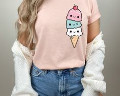 Ice Cream Shirt, Kawaii Ice Cream T-Shirt, Ice Cream Lovers T-Shirt, Ice Cream Tees, Ice Cream Lover, Summer Shirt, Cute Ice Cream Shirt Thank you so much for choosing us! How To Order 1️⃣ Please review all the information provided before placing an order. 2️⃣ Select the shirt type and size using the drop down menu. 3️⃣ Select the color of the shirt using the following drop down menu. 4️⃣ Once all your desired items are in your cart you may complete your order by entering your payment method, de Kawaii Crew Neck Top With Letter Print, Cute Cartoon Print Short Sleeve Tops, Kawaii Long Sleeve T-shirt For Summer, Cute Short Sleeve Tops With Cartoon Print, Kawaii Long Sleeve Summer T-shirt, Casual Spring T-shirt With Cute Design, Kawaii Funny Print Crew Neck Top, Kawaii Crew Neck Top With Funny Print, Kawaii Short Sleeve Tops With Letter Print