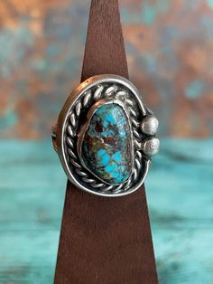 Vintage Sterling Silver & Turquoise Navajo Native American Ring Layaway Available Size 11.5 13.4 grams Please see pictures for measurements. Turquoise stone is an excellent condition. Before purchasing, please make sure your shipping address is correct in your Etsy account. I will not change the shipping address after purchase due to so much buyer fraud going around. If you purchase and need an address change, we will have to cancel the transaction and start over.  Return Policy- Buyer must contact me within 5 days of delivery to notify me of return and ship with tracking insured within 7 days of receiving the item. No returns after the allotted days. Buyer pays return shipping and must return item with tracking number. Once item is returned back to me in its original condition, a refund w Southwestern Style Ring With Patina, Adjustable Southwestern Style Ring With Patina, Southwestern Adjustable Oval Turquoise Ring, Untreated Adjustable Western Turquoise Ring, Adjustable Rustic Turquoise Ring, Rustic Adjustable Turquoise Ring, Address Change, Native American Rings, Silver Turquoise