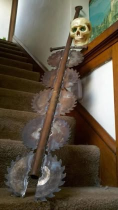 a skeleton head sitting on top of a stair case