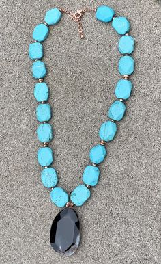 Back to Blue Turquoise Magnesite & Agate Pendant Necklace Barse Genuine Agate Genuine Turquoise Magnesite Genuine Hematite & Copper Genuine Bronze Lobster Clasp Closure Crafted and Finished By Hand CCRUN03MUC Approximate Measurements: Length- 16"-18"+ 2" Extender; Pendant Slab Slice- 1 3/4" Live your life in color with this beautiful statement pendant necklace. Pair this with a simple white V-neck t-shirt, white jeans, a denim jacket and you will be ready for a night out on the town with Turquoise Agate Gemstone Beaded Necklaces, Turquoise Agate Beaded Necklace, Turquoise Agate Beaded Necklace With Gemstones, Turquoise Agate Gemstone Beaded Necklace, Blue Turquoise Howlite Necklace With Round Beads, Blue Turquoise Chrysocolla Necklace With Gemstone Beads, Blue Turquoise Necklace With Gemstone Beads, Chrysocolla Turquoise Necklace With Gemstone Beads, Blue Howlite Round Bead Jewelry