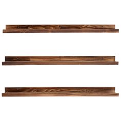 three wooden shelves with metal brackets on each shelf