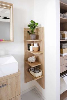 the bathroom is clean and ready to be used as a storage area for towels or other items