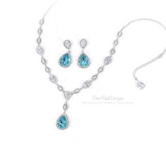 This sparkling bridal necklace featuring Swarovski Light Turquoise Teardrop Crystal, AAA zirconia and rhinestones and finished off with lobster clasp. This gorgeous statement necklace will look elegant and beautiful quality on any modern, classic or vintage inspired bride! Perfect for party, cocktail party and wedding ceremony whether you are the bride or a bridesmaid. All Zirconia shine a lot! Finish: Silver Platinum plated components Swarovski Crystal: Light Turquoise Material: Rhinestones, Sw Light Blue Crystal Jewelry For Wedding, Light Blue Crystal Wedding Jewelry, Light Blue Crystal Jewelry For Formal Occasions, Turquoise Cubic Zirconia Jewelry Gift, Turquoise Crystal Jewelry For Gifts, Turquoise Crystal Jewelry Gift, Elegant Turquoise Jewelry Sets For Wedding, Elegant Turquoise Wedding Jewelry Sets, Blue Aquamarine Wedding Jewelry