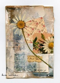 an altered collage with flowers in a vase and writing on the bottom half of it