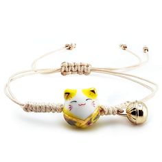 PRICES MAY VARY. Title: Omky Lucky Cat Maneki Neko Bacelet Adjustable | 6 Colors | Ceramic Bead (Yellow). Product Type: Categories > Dress Up & Pretend Play > Dress-Up Accessories > Jewelry > Bracelets Cat Bead, Ceramic Cat, Maneki Neko, Lucky Cat, Polymer Clay Beads, Ceramic Beads, Clay Beads, Blue Beads, Playing Dress Up