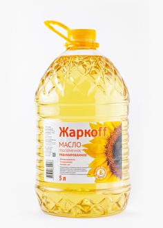 a bottle of oil that is yellow and has a sunflower on the front side