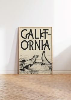 a poster on the wall that says california orna with two sea lions in it