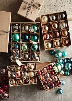 several boxes filled with different types of ornaments