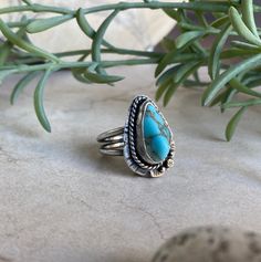 This handmade ring is made of sterling silver and Cripple Creek turquoise.  The versatile Southwestern style is both casual and elegant.  Inner diameter is 18mm (size 7 3/4). Southwestern Sterling Silver Teardrop Ring, Southwestern Turquoise Teardrop Ring, Southwestern Turquoise Ring In Sterling Silver, Southwestern Style Turquoise Gemstone Ring In Sterling Silver, Western Style Turquoise Sterling Silver Ring, Rustic Turquoise Sterling Silver Jewelry, Nickel-free Southwestern Sterling Silver Rings, Southwestern Style Nickel-free Sterling Silver Rings, Western Sterling Silver Gemstone Ring