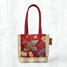 This medium, hand-sewn Beige & Red Tote Bag is perfect for carrying your items to school, work, church, shopping, or travel. It also makes a great gift! ★ Features: * One-of-a-Kind: Personally handsewn by me using carefully selected fabrics, ensuring that you'll carry a truly unique, one-of-one piece. * Convenient Design: With no zippers or snaps, this tote bag is easy to throw on and go! * Travel-Friendly: Collapsible design allows for travel and saving space. * Eco-Friendly: Made from upcycled fabrics, this tote is a sustainable choice for the environmentally conscious. * Stylish and Durable: Fully lined with coordinating fabric for added durability and a polished look. ★ Details: * Size: 9.25" height x 12" width x 4.5" deep x 25" strap length * Pockets: 2 interior pockets * Primary Colo Red Square Satchel For School, Casual Red Rectangular Satchel, Casual Red Square Satchel, Red Square School Bag, Red Square Satchel For Daily Use, Red Rectangular Shoulder Bag For School, Red Square Shoulder Bag For Daily Use, Red Square Bag For Daily Use, Casual Red Fabric Bag