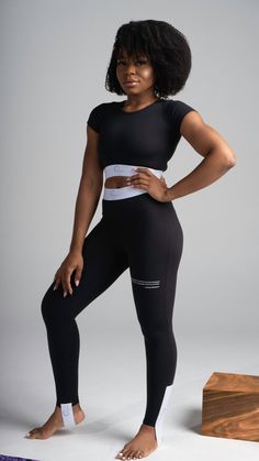 Double lined Elastic waistband on leggings and crop top 2 piece set Athleisure Cropped Sports Bottoms, Cropped Athleisure Bottoms For Sports, Cropped Elastane Activewear For Yoga, Fitted Sportswear Crop Top For Workout, Fitted Crop Top For Workout, Sporty Fitted Cropped Bottoms, Seamless Compression Cropped Top, Fitted Short Sleeve Athleisure Sets, Cropped Elastane Activewear For Athleisure