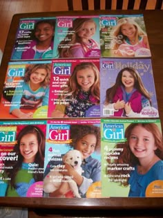 several magazines on a table with children's magazine covers in front of the camera