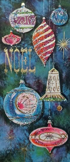 an image of christmas ornaments with the word noel written on them in gold and blue