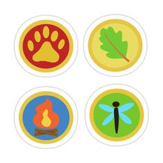 four stickers with different types of animals and leaves on them, including a dog's paw