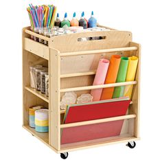 Organize with Ease: Discover the Perfect Storage Solution for Kids' Belongings. Versatile Storage Solution: This Kids' Multi-Functional Trolley features 2 front shelves, 3 side shelves, 1 back shelf, and 2 storage bins, providing plenty of space to organise toys, books, and other belongings. Easy to Move Around: Equipped with lockable castors and 4 handles, this trolley is easy to manoeuvre, allowing children to conveniently transport their toys from room to room. Classroom Stationary Organisation, Art Trolley, Organise Toys, Organizing Craft Supplies, Primary School Classroom, Kids Bedroom Storage, Dryer Rack, Side Shelves, Classroom Organisation