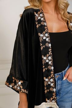 SALE ITEM - FINAL SALEFeaturing: Jacket Cardigan Fringe on Bottom Hem and Back Floral Embroidery Premium Velvet Mini Length Color: Black.Brand: Unmatched BYU Length: x Embroidered Open Front Outerwear For Fall, Black Cardigan With Floral Embroidery, Elegant Black Embroidered Cardigan, Fall Black Intricately Embroidered Outerwear, Elegant Black Kimono With Floral Embroidery, Elegant Black Floral Embroidery Kimono, Black Embroidered Fall Kimono, Black Embroidered Long Sleeve Kimono, Elegant Black Embroidered Kimono