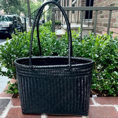 Finely Finished With Subtle Sheen, This Shaped Ebony Palm Leaf Tote Bag Is Both Elegant And Casual At The Same Time. Dress It Up Or Wear Down With Your Favorite Pair Of Jeans. This Is The Perfect Versatile And Stylish Accessory! Handwoven By Indigenous Mexican Artisans. Take This Bag Out With You For A Night On The Town, Or Take It To The Beach Or Summer Pool Party!! Classic Straw Tote Bag For Everyday Use, Classic Woven Rectangular Bag, Classic Rectangular Woven Bag, Classic Rectangular Woven Bags, Black Woven Rectangular Shoulder Bag, Black Woven Shoulder Bag With Double Handle, Black Double Handle Woven Shoulder Bag, Black Straw Tote Bag With Handles, Black Tote Straw Bag With Handles