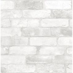 a white brick wall with no mortars on it