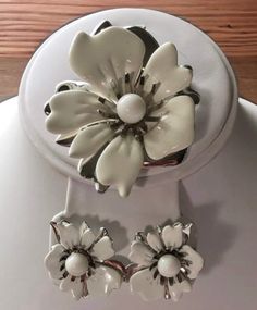 "Vintage Sarah Coventry white and silver flower brooch and earrings.  The 2 inch flower brooch has white enamel and silver petals.  The matching clip on earrings have the same design completing the \"Summer Magic\" set.  All jewelry sent in a gift box. Check out more vintage Sarah Coventry  https://www.Etsy.com/shop/Historicallyhers" Summer Magic, 1960s Jewelry, Sarah Coventry, Silver Pin, Flower Jewelry, Birthday Gift For Her, Coventry, Jewellery Sets, Silver Flowers