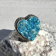 Blue Titanium Druzy Quartz Heart Ring Hand Crafted 925 Sterling Silver Overlay Vintage Style Setting Size 7.5 New Bracelet Not Included Blue Sterling Silver Heart Ring, Blue Sterling Silver Heart Cut Ring, Blue Heart Cut Sterling Silver Ring, Blue Adjustable Heart Ring, Adjustable Blue Heart Ring, Blue Sterling Silver Heart Ring Gift, Heart Shaped Sterling Silver Blue Rings, Blue Heart Sterling Silver Ring For Gift, Blue Heart-shaped Sterling Silver Rings