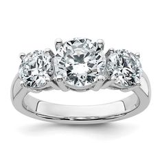 three stone diamond ring in white gold with diamonds on the sides and four stones at the top