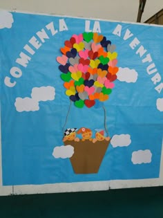 a bulletin board with a hot air balloon floating in the sky