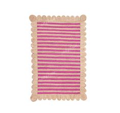 a pink and white striped rug with scalloped edges on a white background in the shape of a rectangle