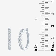 Features: Quick ShipDiamond Clarity: I1-I2Earring Back: HingedSetting: NickStone Cut: RoundDiamond Color: G-HMetal Color: WhiteEarring Length: 20mmEarring Width: 3mmRounded Carat Weight: 1/4 Ct. T.w.Care: Wipe CleanStone Type: 14 Lab Grown DiamondAuthenticity: Lab Grown DiamondBirthstone: April BirthstoneEarrings Style: Hoop EarringsMetal: Sterling SilverCountry of Origin: Imported Small Hoop Diamond Earrings With Accents, Hypoallergenic Diamond Hoop Earrings, Small Hoop Diamond Earrings In White Gold, White Diamond Small Hoop Earrings, Small White Diamond Hoop Earrings, White Diamond Hoop Earrings For Pierced Ears, Small Silver Hoop Earrings With Halo Design, Classic White Hypoallergenic Hoop Earrings, White Hypoallergenic Classic Hoop Earrings