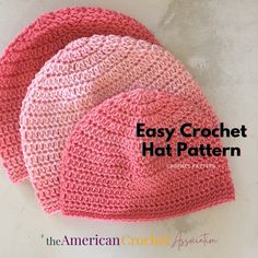 two crocheted hats sitting next to each other