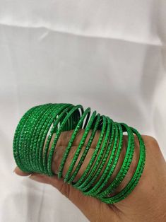 Welcome to our shop We bring to you very ethnic products from core of India almost every thing is handmade or custom made Set of 22 Bangles in multiple colors Size 2.4 We will be happy to serve you Adjustable Green Bangle For Party, Handmade Green Bangle For Party, Handmade Green Bangle For Festive Occasions, Green Bangle For Party Festivals, Green Bangle For Party And Festivals, Traditional Green Bracelets For Party, Bohemian Stackable Bangle For Party, Stackable Bohemian Bangle For Party, Adjustable Green Bracelets For Festivals