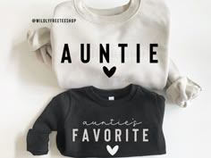 Our matching Auntie and Aunties Favorite sweatshirts are the perfect addition to your and your nieces'/nephews' wardrobe! These adorable sweaters also make the perfect for gift any Aunt including new Aunts or any aunt to be! We also offer additional family member shirts as well so be sure to check them out. If you have any questions please feel free to reach out anytime and we are happy to help you. **PLEASE NOTE: THIS IS NOT A SET - SHIRTS MUST BE PURCHASED SEPARATELY IN ORDER TO RECEIVE BOTH AUNTIE AND MINI SHIRTS. IF YOU HAVE ANY QUESTIONS FEEL FREE TO REACH OUT ANYTIME AND WE WILL BE HAPPY TO ASSIST YOU.  HOW TO ORDER  1. Select the size of the auntie shirt and then add to cart.  2. Go back to the listing from your cart and add the mini size to cart. 3. Submit Order  4. During checkout Auntie Niece Shirts, Auntie And Niece Shirts, Aunt Niece Shirts, Aunt And Niece Shirts, Aunt Baby Clothes, Aunt Nephew, Mini Shirts, Aunt To Be, Baby Aunt