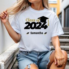 Personalized Graduation Shirt Design 2024 Graduation Shirt Senior Of 2024 Introducing Our Newest Lineup Of T-Shirts: The Gildan 5000 Series, Effortlessly Combining Style And Comfort! Offered In Sizes From S To 3xl, And An Assortment Of Lively Colors. Crafted For Enduring Comfort And Resilience. Experience Fast Shipping For Added Convenience. Require Adjustments To Your Order? Simply Contact Us After Your Purchase! Black Crew Neck Top For Graduation Party, Black Tops With Letter Print For Graduation Party, Graphic Print Crew Neck Top For Graduation Party, Short Sleeve Tops With Graphic Print For Graduation Party, Graphic Print Short Sleeve Top For Graduation Party, Crew Neck Tops With Letter Print For Graduation Party, Graduation Party Letter Print Short Sleeve Tops, Graduation Party Tops With Letter Print And Short Sleeves, Cotton Crew Neck Tops For Graduation Party