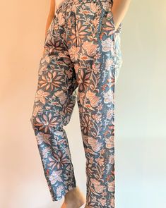 100% organic cotton pajamas in an elegant print that seamlessly marries the calming neutrality of grey with the vibrant warmth of orange blossoms. Adjustable waistband with drawstring for customizable fit. Practical pockets to keep your essentials close at hand like your phone or tv remote. No shrinkage, non-stretch. FREE  SAME DAY shipping. Ships from a small business in North Carolina, USA 🇺🇸  Perfect for those who value comfort and sustainability in their sleepwear. Ultimate comfort and bre Cotton Sleep Pants With Pockets, Comfortable Cotton Sleep Pants, Cotton Wide Leg Sleepwear For Pajama Party, Relaxed Fit Floral Bottoms For Loungewear, Wide Leg Cotton Sleepwear, Cotton Wide Leg Sleepwear For Relaxation, Wide Leg Cotton Sleepwear For Relaxation, Cotton Wide Leg Sleepwear For Lounging, Floral Print Sleep Bottoms For Summer