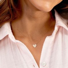 An array of dazzling diamonds illuminates this 14k gold heart necklace and elevates a timeless silhouette. Product Details 0.358 total carat weight Fifty-four .9mm and four 1mm GH SI1 white diamonds 14k gold 15" chain + 2" extender. Adjustable in 1" increments 15" - 17" Heart measures 3/8" Spring ring closure Avoid contact with anything containing derivatives of alcohol | Diamond Pave Heart Necklace in Gold, Women's in 14k gold by Fine 14k Gold Heart Pendant Diamond Necklace For Anniversary, Luxury Double Heart Necklace With Diamond Accents, Luxury Double Heart Diamond Necklaces, Rose Gold Diamond Heart Necklace With Charm, Rose Gold Diamond Heart Pendant Necklace, Heart Necklace With Single Cut Diamonds For Gift, Heart Necklace With Single Cut Diamonds As A Gift, Rose Gold Heart Pendant Diamond Necklace, Elegant Heart Detail Necklace For Valentine's Day