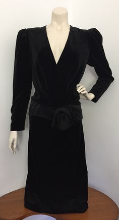 Awesome 1980s retro vintage formal cocktail party dress  Features an alluring plunging v neckline, slightly dropped waist with satin bow detail, straight skirt, zip at back, shoulder pads and check out those fabulous 80's sleeves.  Beautiful deep black cotton velvet fabric creates a wonderful silhouette. This is simply THE perfect dress.  In excellent condition for age. No stains, fading, tears, repairs or odours. Zip runs well.  (Please see pics - some of which are lightened for detail).  Label Formal Cocktail Party, Cocktail Party Dress, Satin Bow, Straight Skirt, Deep Black, Cotton Velvet, Bow Detail, Plunging Neckline, Dress Clothes For Women