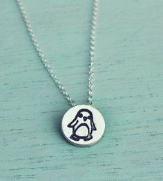 Penguin necklace -- tiny silver penguin jewelry -- trending now jewelry -- best sellers -- cute anim Adjustable Jewelry With Cute Design Gift, Cute Silver Charm Necklaces For Friendship, Cute Silver Round Charm Necklace, Gift Tiny Round Pendant Charm Necklaces, Cute Sterling Silver Necklace Gift, Cute Silver Round Charm Necklaces, Tiny Round Pendant Charm Necklaces As Gift, Cute Sterling Silver Necklace For Gift, Tiny Round Pendant Charm Necklaces For Gift