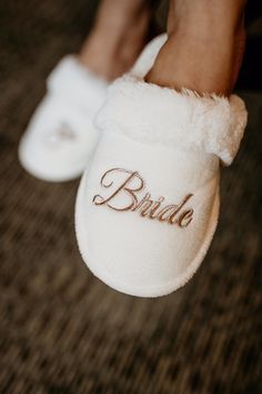 a bride slipper with the word bride written on it