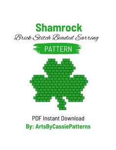 the shamrock is made out of bricks and has green paint on it, as well as text