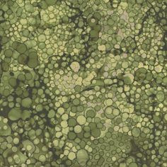 an abstract green background with circles and bubbles in the center, as well as small dots