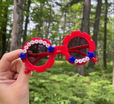 Dive into spring and summer time with these adorable sunnies for the kids! These are perfect for beach days, birthday party favors, photoshoots, flower girl gifts and MORE! These sunglasses are completely customized for whatever you would like! Step 1: - Please indicate what color sunglasses you would like Step 2:  - Let me know what color bead for the text you would like. I have black and gold. Step 3: - Use the personalization box to let me know the name or text you would like on the sunnies! NOTE: The flower bead design will vary and placed as seen fit on to the sunglasses. Therefore, you can expect the style to look exactly the same but the flower shape will vary. I do have many colors so if you are looking for specific colors please let me know and I will try my best to accommodate to