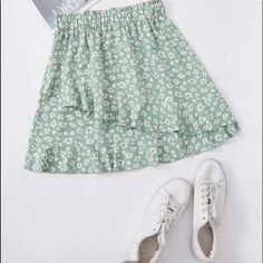 A Cute Short Floral Skirt. High Waisted And Flowing. Mint Green And White. Never Worn. Casual Green Tiered Mini Skirt, Green Bottoms With Ruffle Hem, Green Skirted Bottoms With Ruffle Hem, Casual Ruffle Hem Skort, Green Ruffled Skirt For Day Out, Casual Green Ruffled Skirt, Green Casual Skirt With Ruffles, Green Ruffled Skort For Spring, Casual Green Skirt With Ruffles